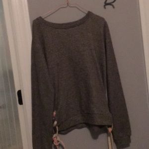 Grey sweater with side detailing